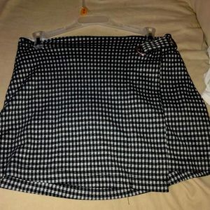 A Justice plaid skirt. A size 14 in girls.